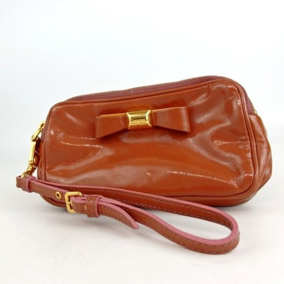 Miu Miu Handbags - Authentic miu miu ribbon pouch with strap patent leather [Used]